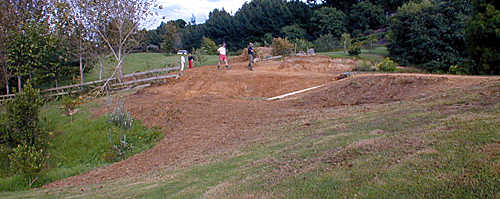 Lower dam, showing where the new pond and waterfall will be.